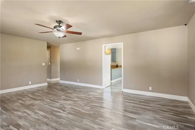 a kitchen with granite countertop a sink and a stove