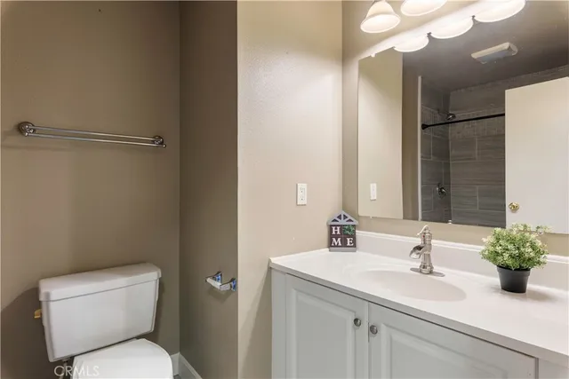 a view of a patio with a table and chairs