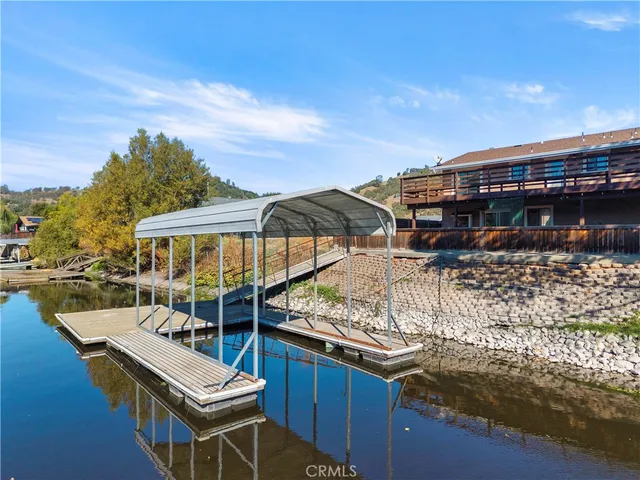 an aerial view of lake residential house with outdoor space