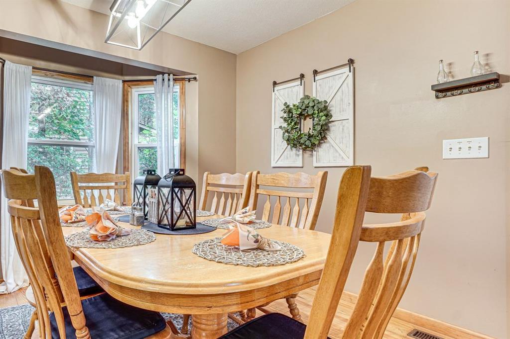 697 Zeppelin Strasse Helen, GA 30545 - Photo 11 of 41 a dining room with furniture and window