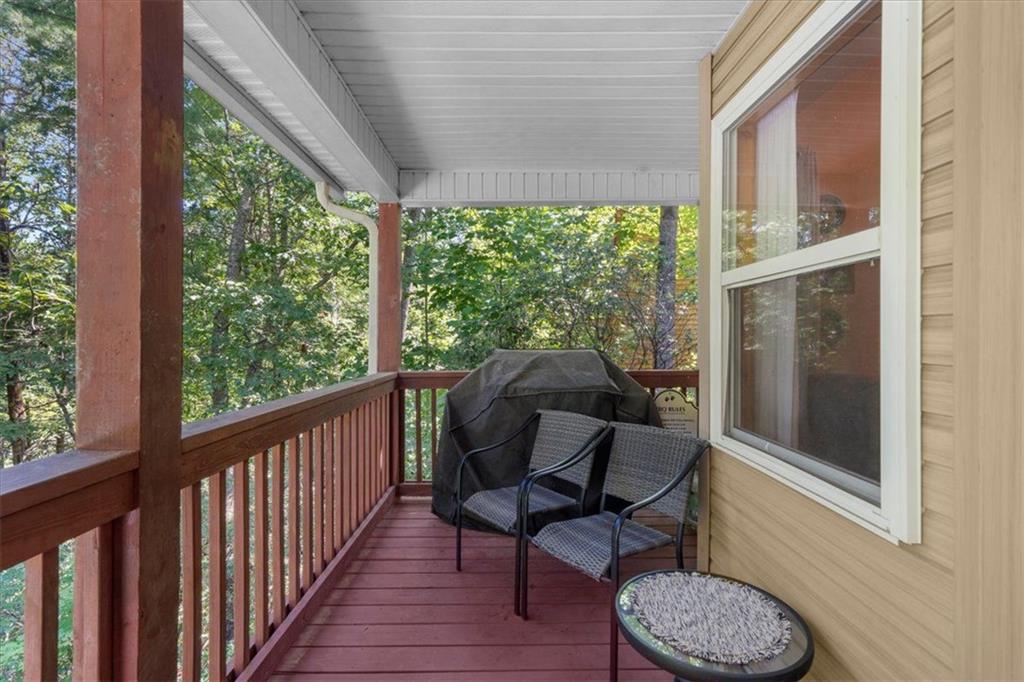 697 Zeppelin Strasse Helen, GA 30545 - Photo 26 of 41 a view of a chair and table in the balcony