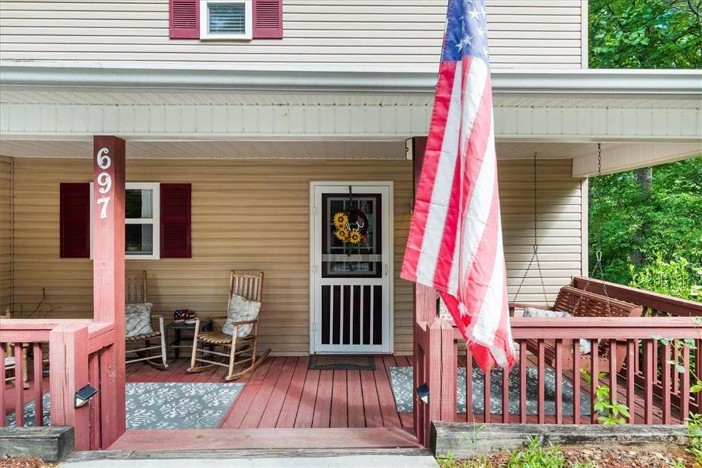 697 Zeppelin Strasse Helen, GA 30545 - Photo 3 of 41 a view of front door and deck
