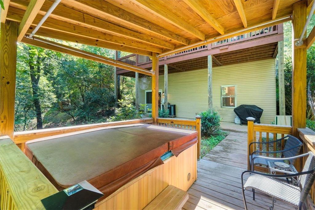 697 Zeppelin Strasse Helen, GA 30545 - Photo 38 of 41 a view of backyard with a patio and wooden floor