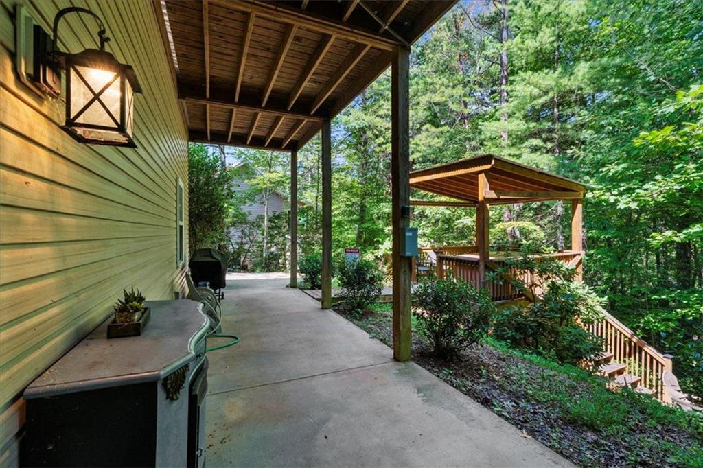 697 Zeppelin Strasse Helen, GA 30545 - Photo 41 of 41 a view of backyard with plants and outdoor seating