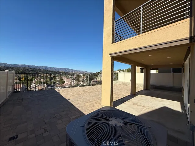 a view of a backyard with a patio