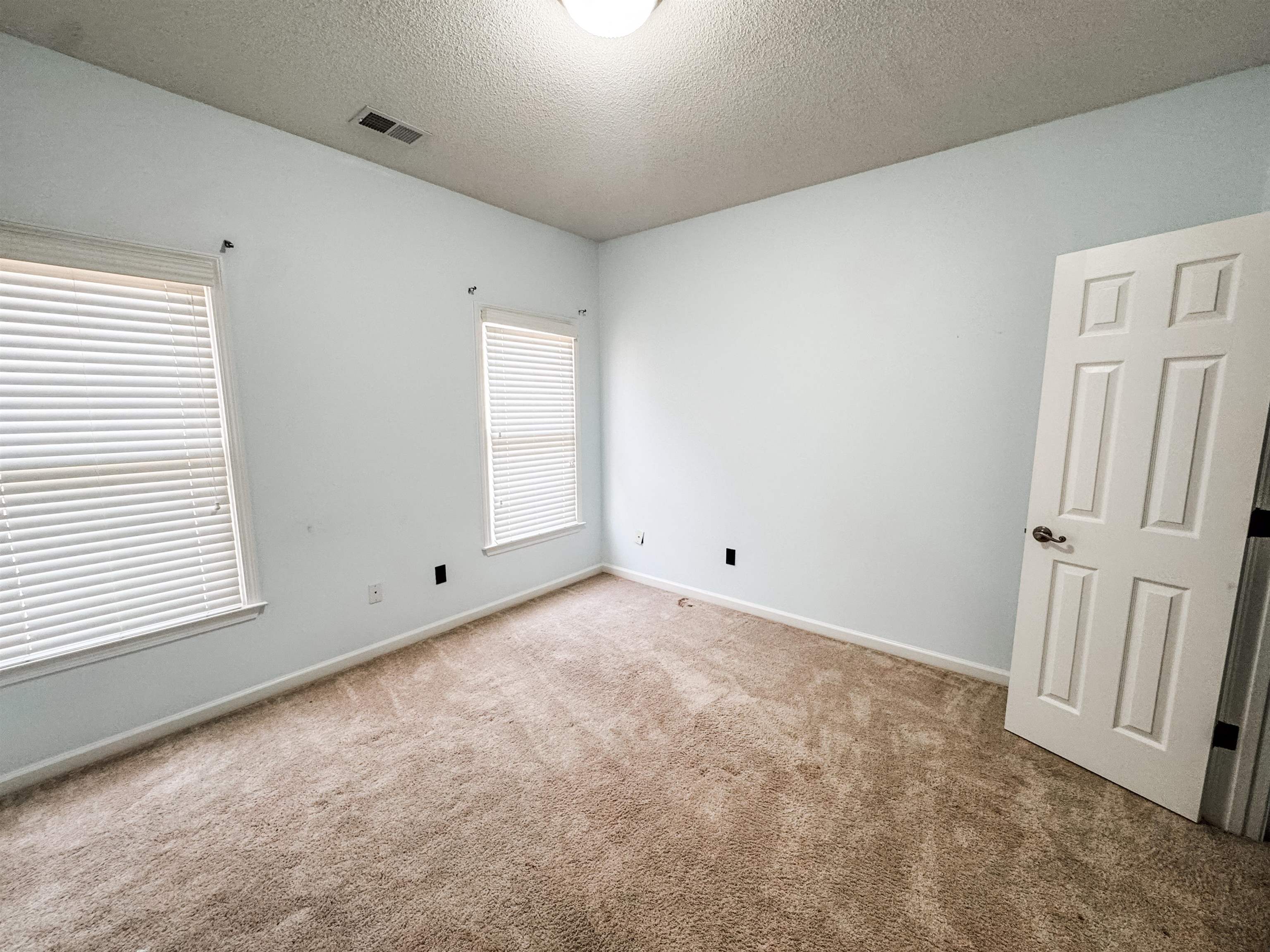 10521 Red Stone Drive Collierville, TN 38017 - Photo 6 of 15 a view of an empty room and a window