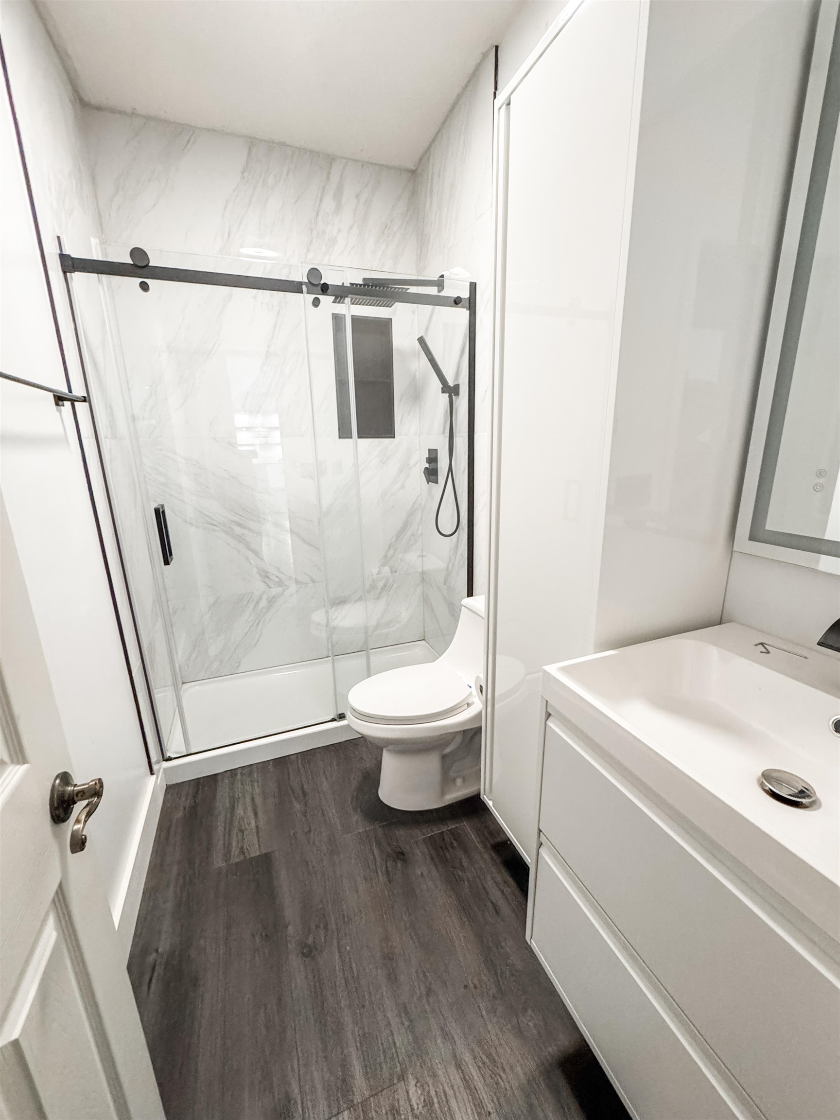 10521 Red Stone Drive Collierville, TN 38017 - Photo 7 of 15 a bathroom with a sink a toilet and a shower