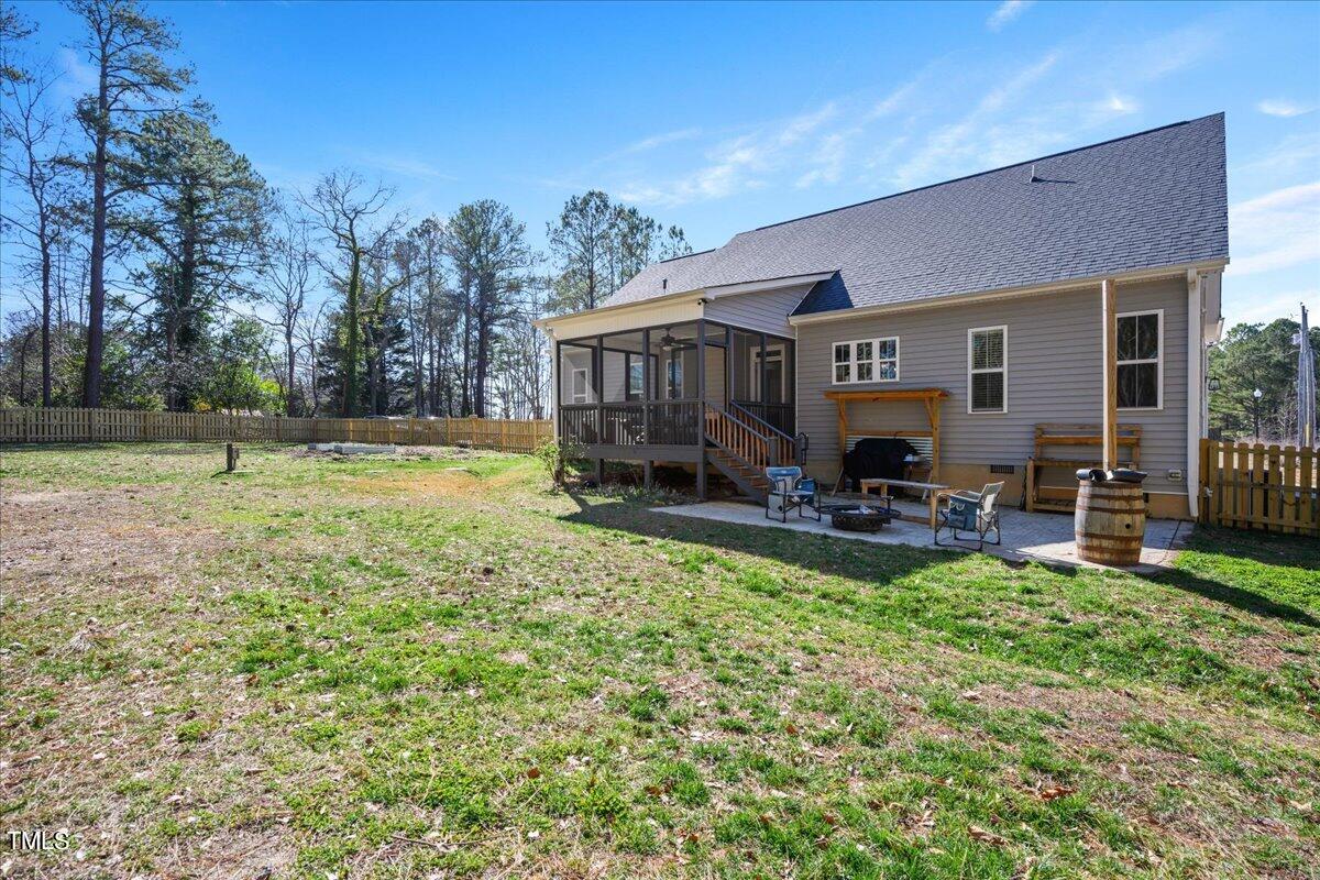 1415 Pine Ridge Road Spring Hope, NC 27882 - Photo 23 of 25 a view of a house with backyard and sitting area
