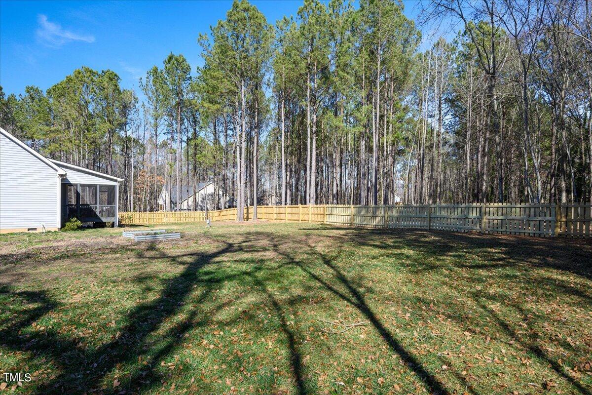 1415 Pine Ridge Road Spring Hope, NC 27882 - Photo 25 of 25 a view of swimming pool with trees
