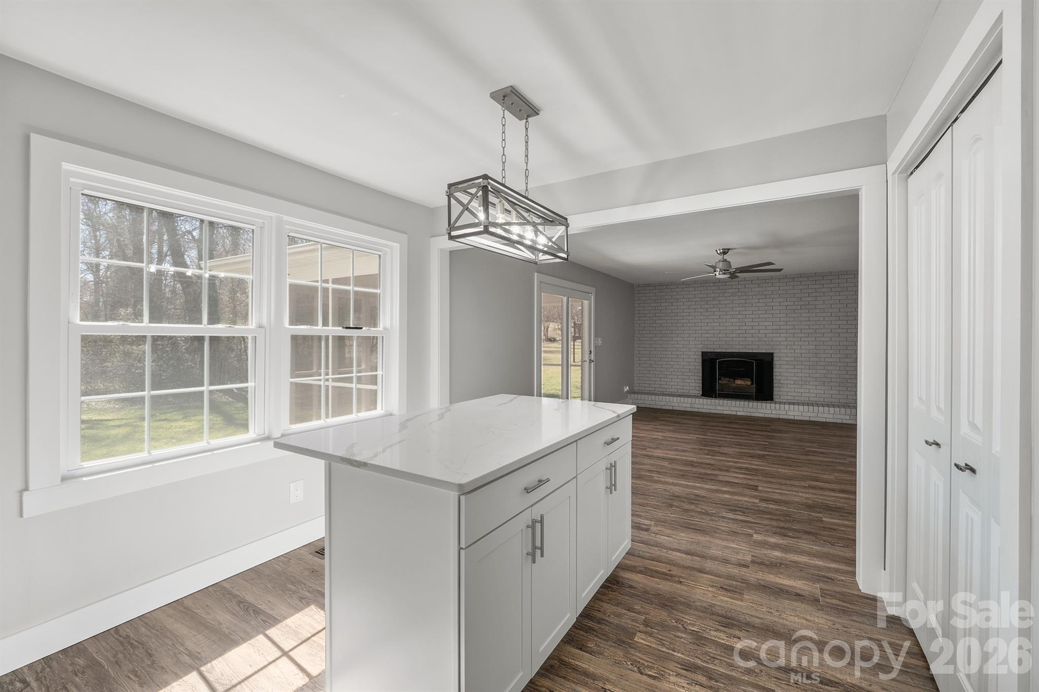 306 7th St Place Northeast Conover, NC 28613 - Photo 21 of 47 a room with a bed and a chandelier