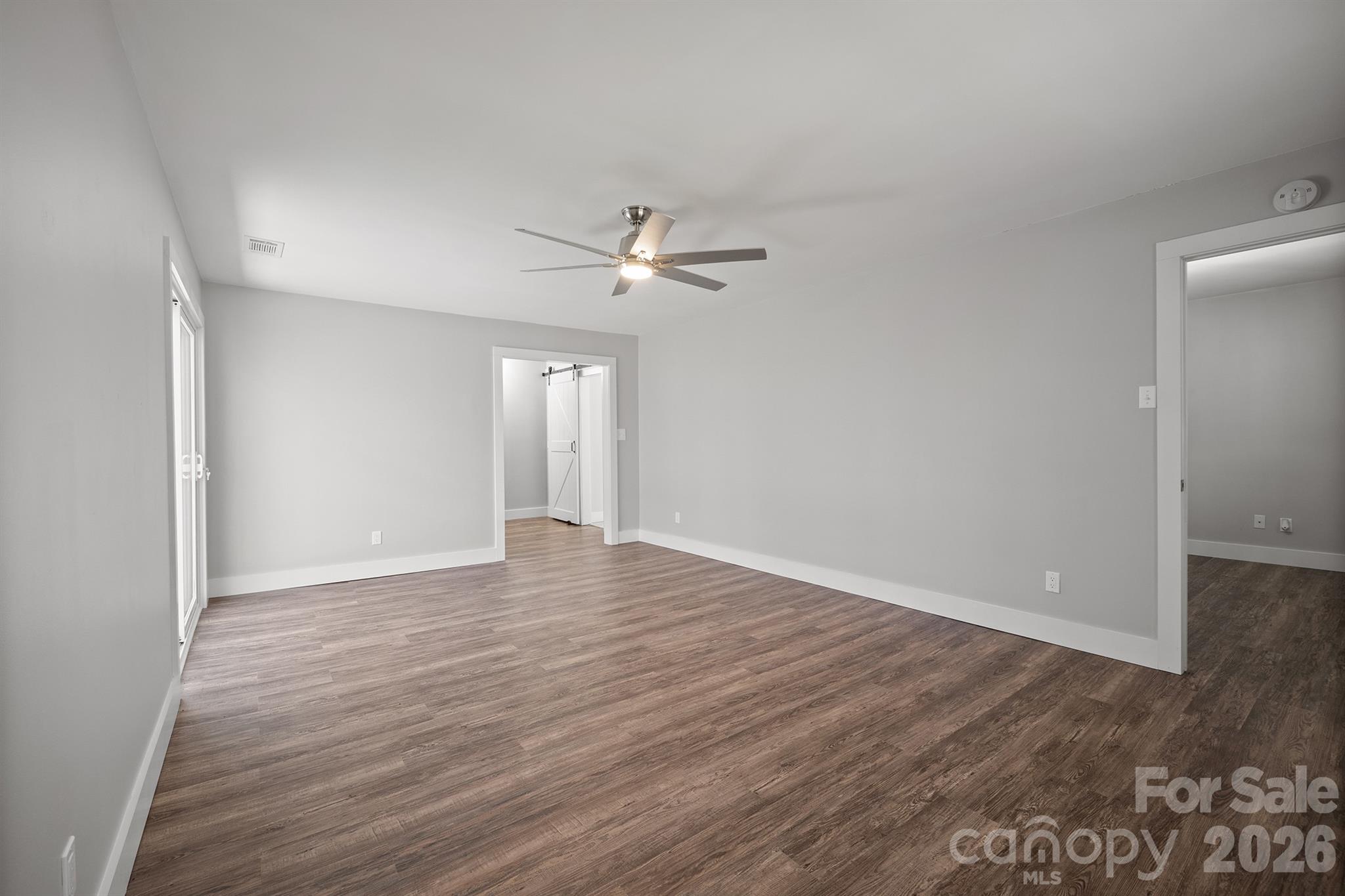 306 7th St Place Northeast Conover, NC 28613 - Photo 29 of 47 a view of an empty room with wooden floor