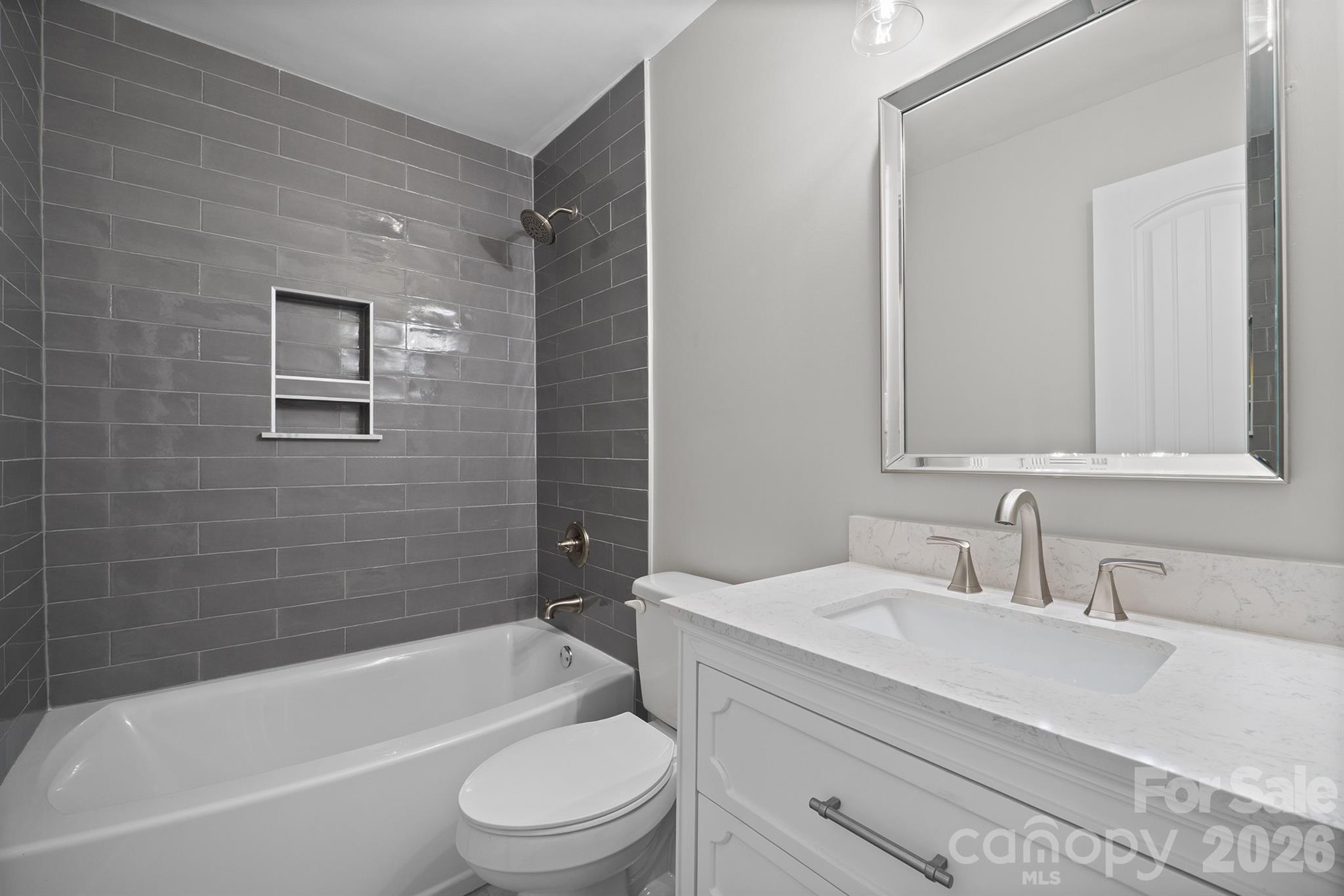 306 7th St Place Northeast Conover, NC 28613 - Photo 38 of 47 a bathroom with a toilet a sink and bathtub