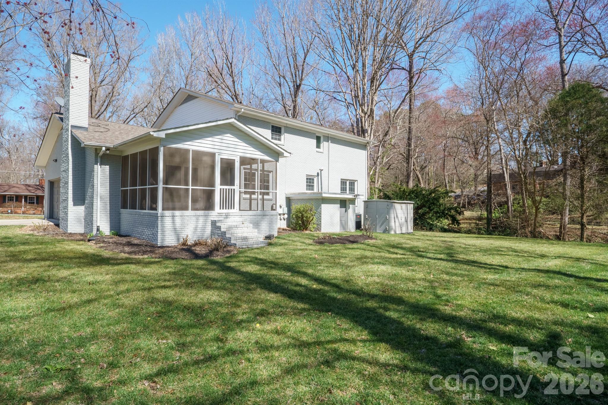 306 7th St Place Northeast Conover, NC 28613 - Photo 46 of 47 a front view of a house with a garden