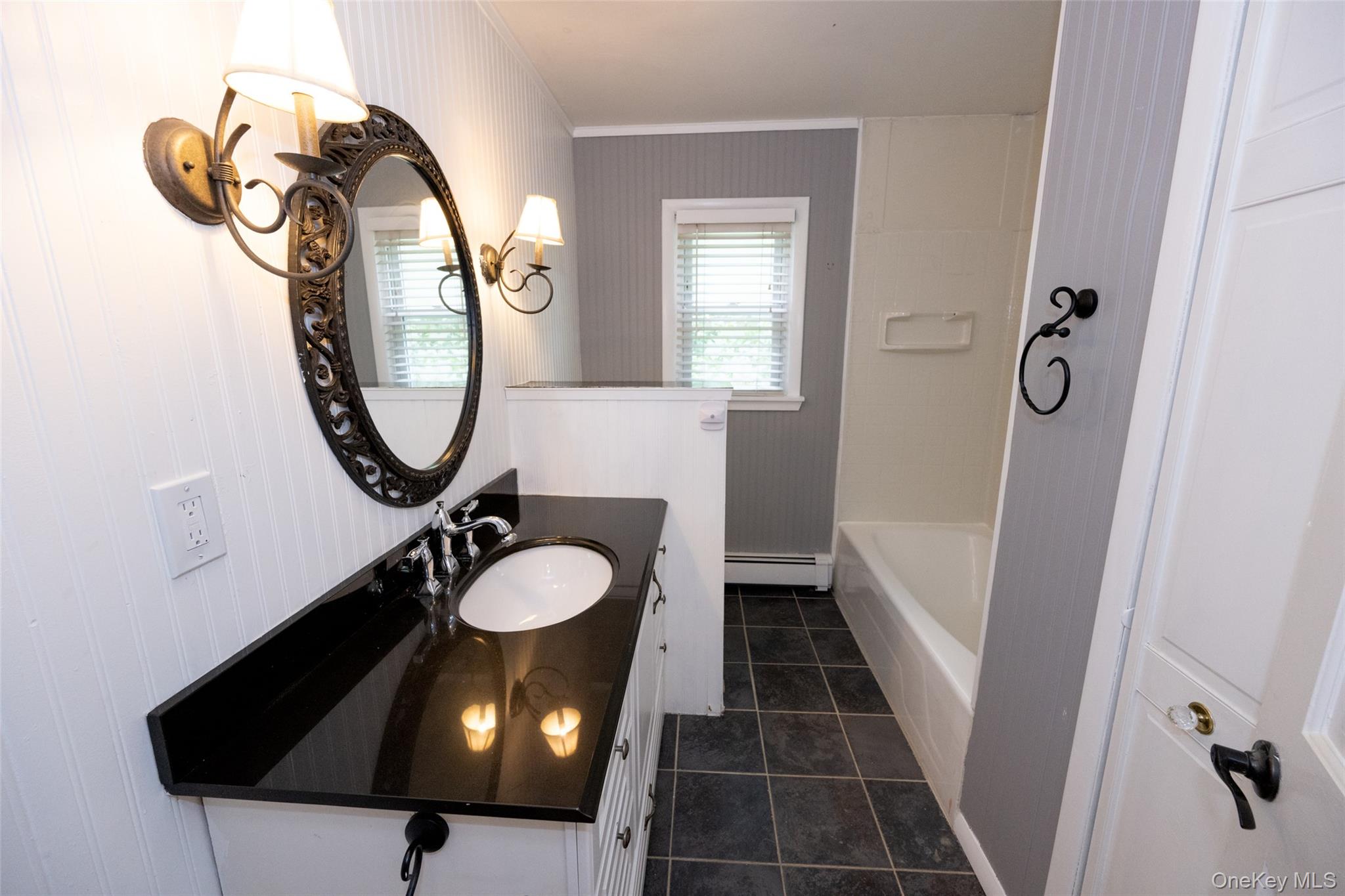136 Foggintown Road Brewster, NY 10509 - Photo 30 of 50 a bathroom with a sink and a mirror