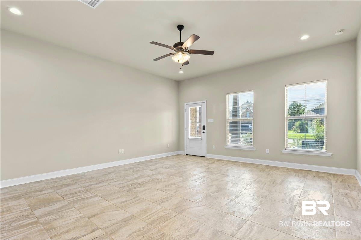 1112 Stella Road Foley, AL 36535 - Photo 5 of 33 Spare room featuring recessed lighting, plenty of natural light, and ceiling fan