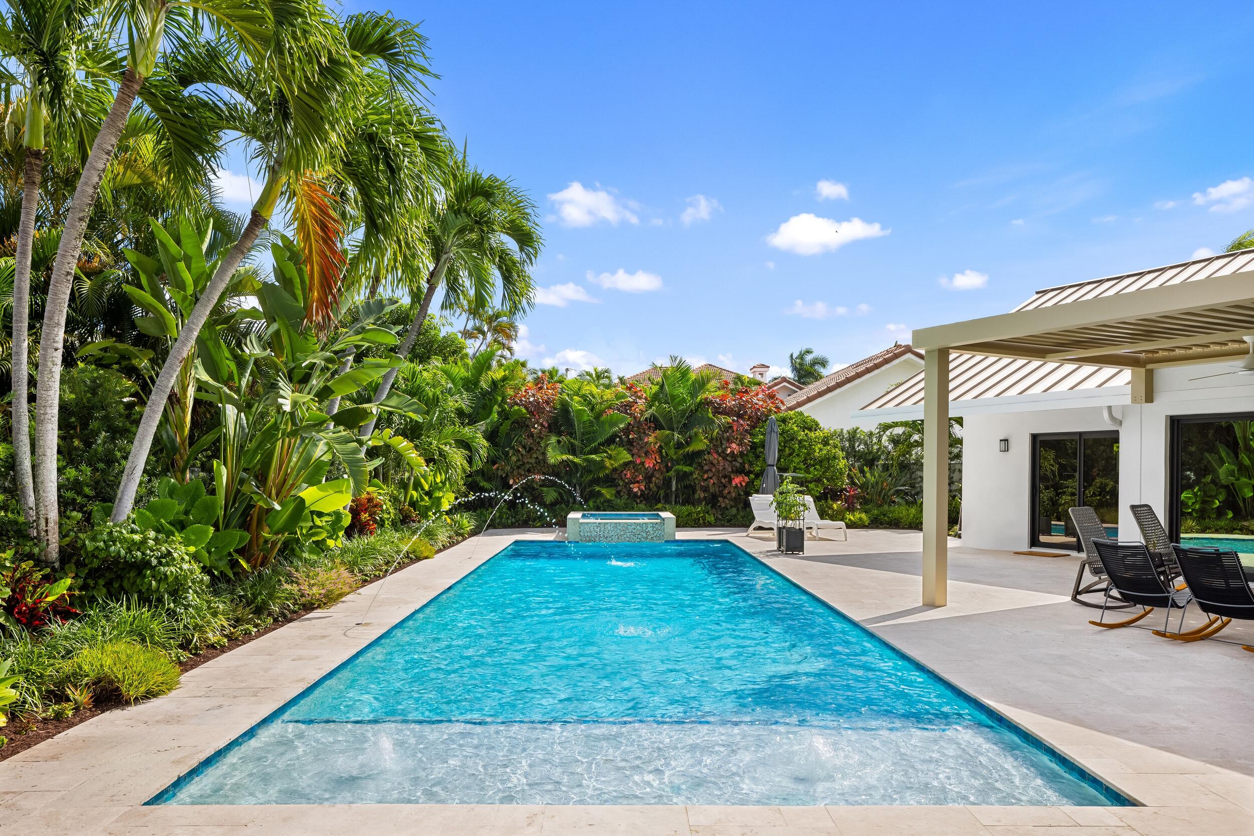 843 Northeast Mulberry Drive Boca Raton, FL 33487 - Photo 40 of 57 a view of a backyard