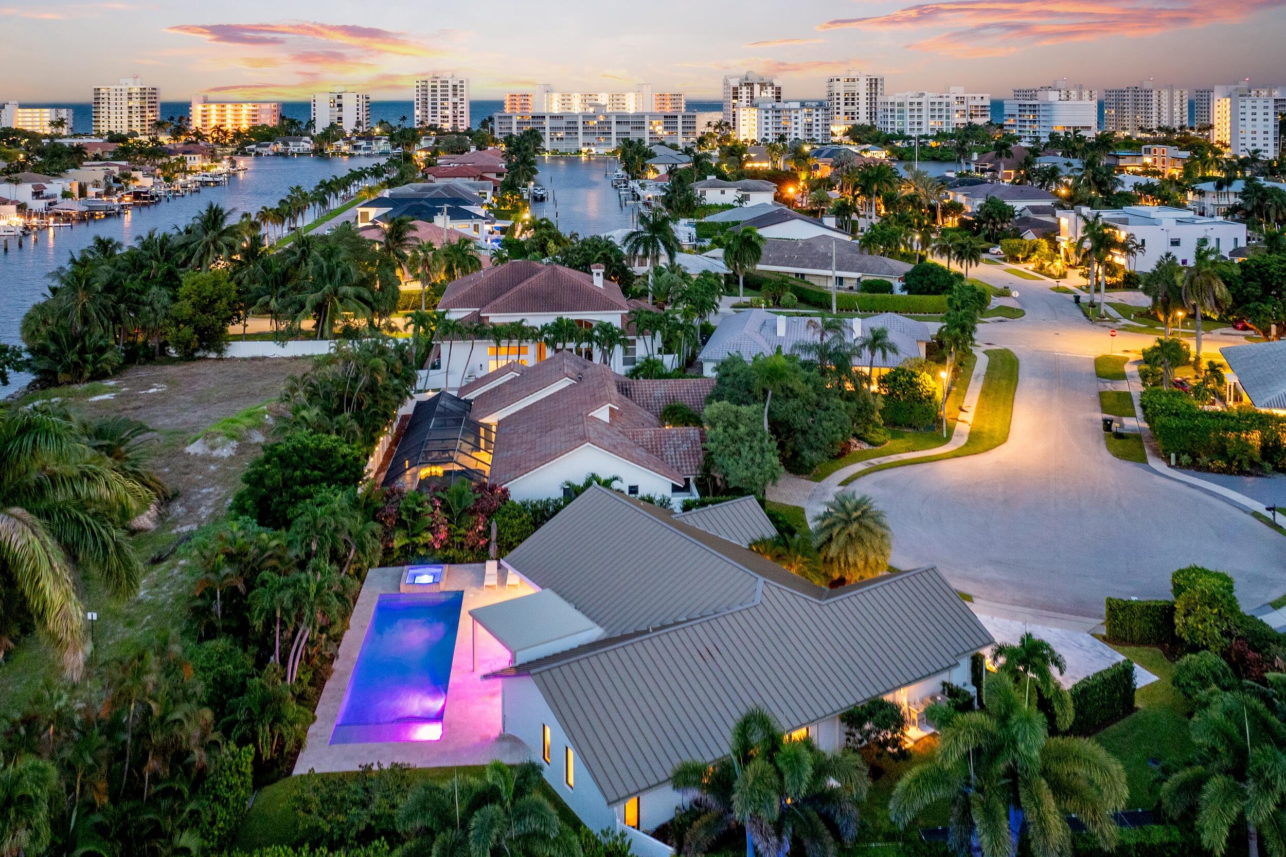 843 Northeast Mulberry Drive Boca Raton, FL 33487 - Photo 46 of 57 an aerial view of residential houses with outdoor space and swimming pool