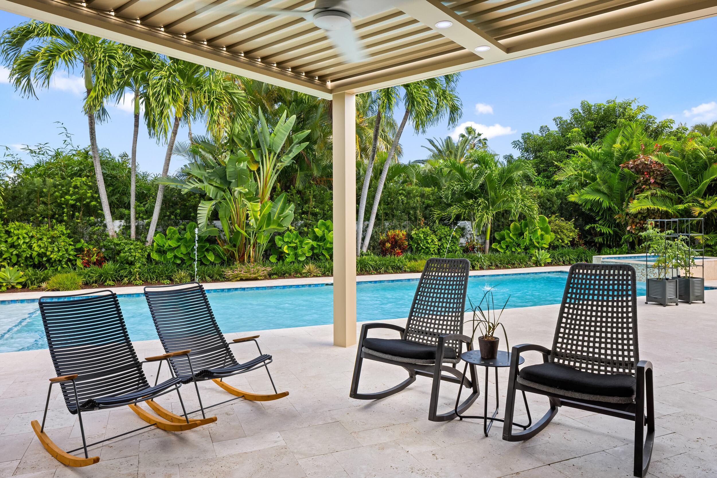 843 Northeast Mulberry Drive Boca Raton, FL 33487 - Photo 5 of 57 a view of an outdoor sitting area with furniture