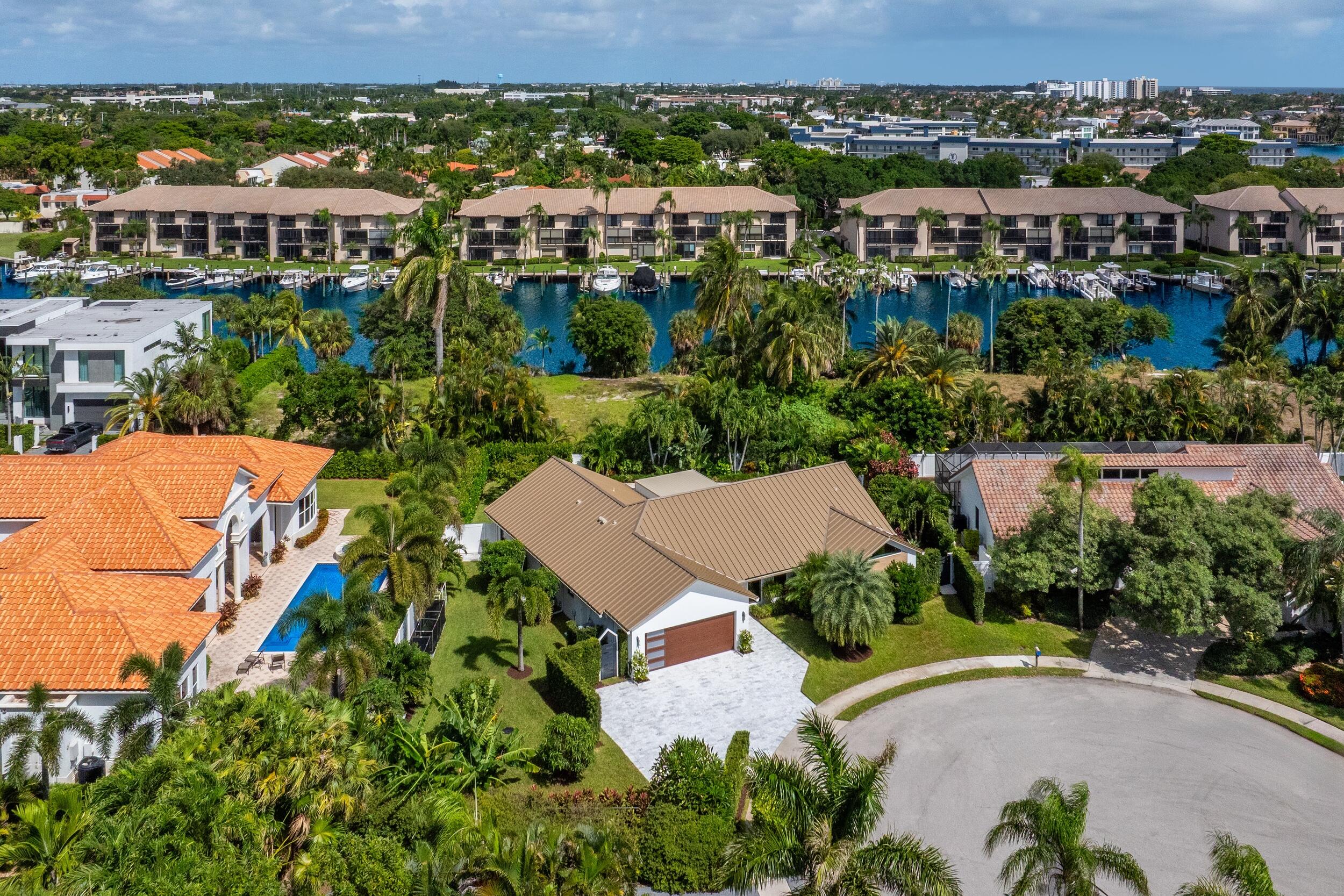 843 Northeast Mulberry Drive Boca Raton, FL 33487 - Photo 53 of 57 an aerial view of multiple house