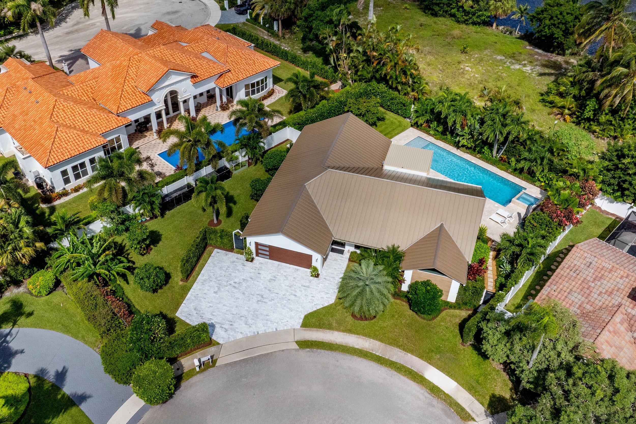 843 Northeast Mulberry Drive Boca Raton, FL 33487 - Photo 54 of 57 an aerial view of a house