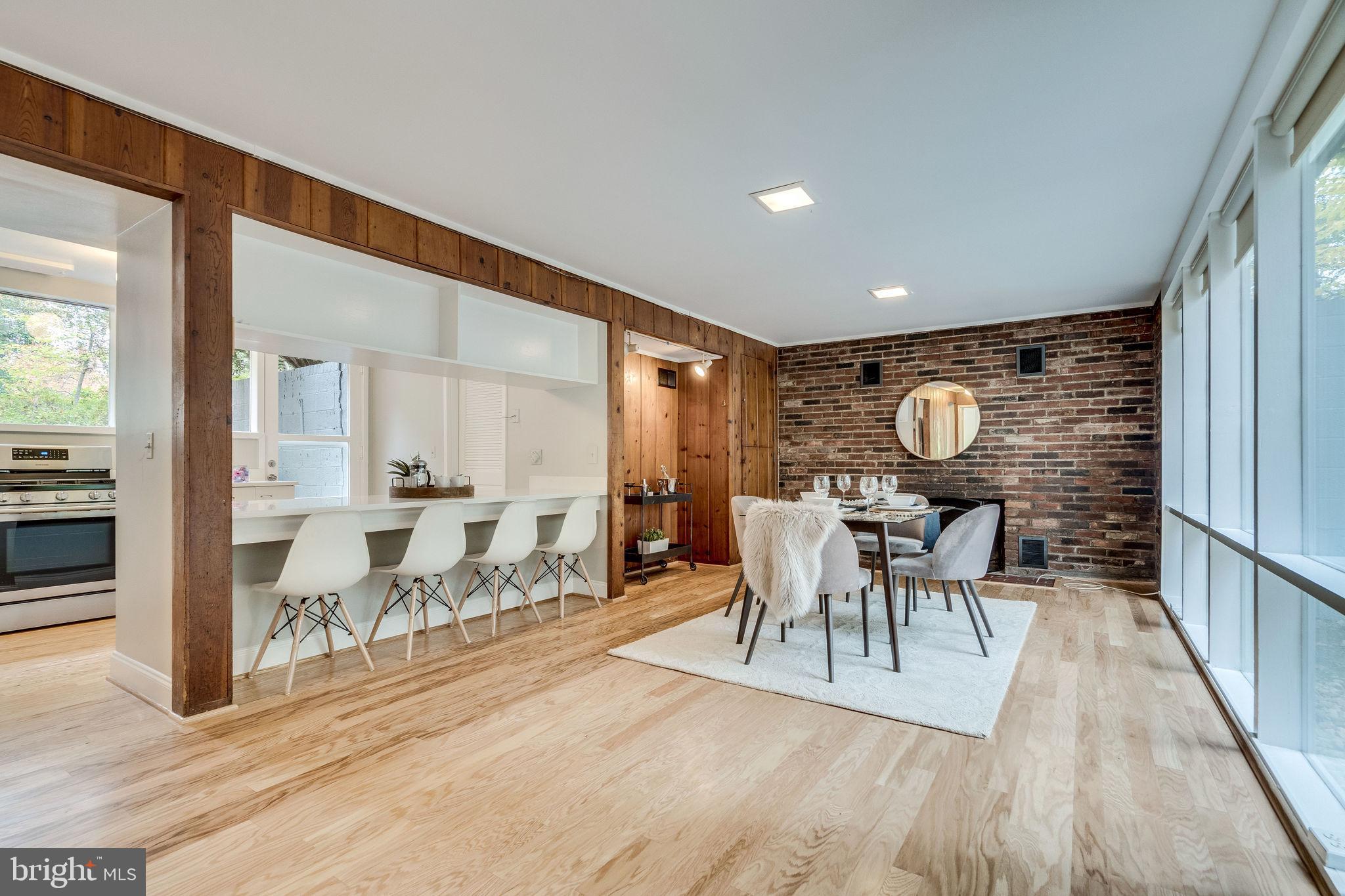 1907 Marthas Road Alexandria, VA 22307 - Photo 18 of 35 Dining room/family room with fireplace and storage