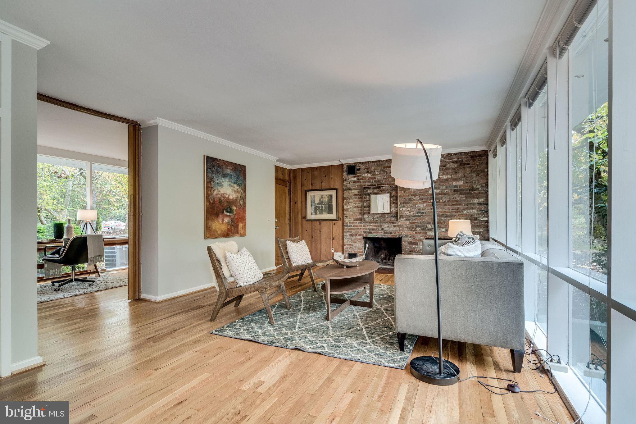 1907 Marthas Road Alexandria, VA 22307 - Photo 4 of 35 Walls of windows and a wood burning fireplace