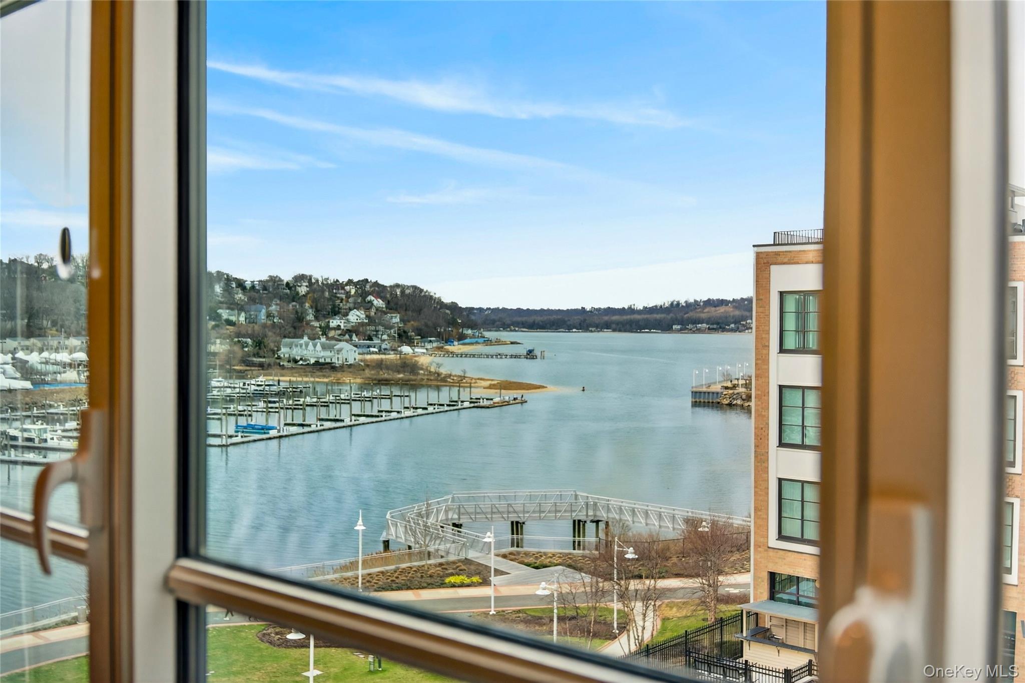 100 Garvies Point Road, Unit 1332 Glen Cove, NY 11542 - Photo 27 of 45 a view of a lake from a balcony