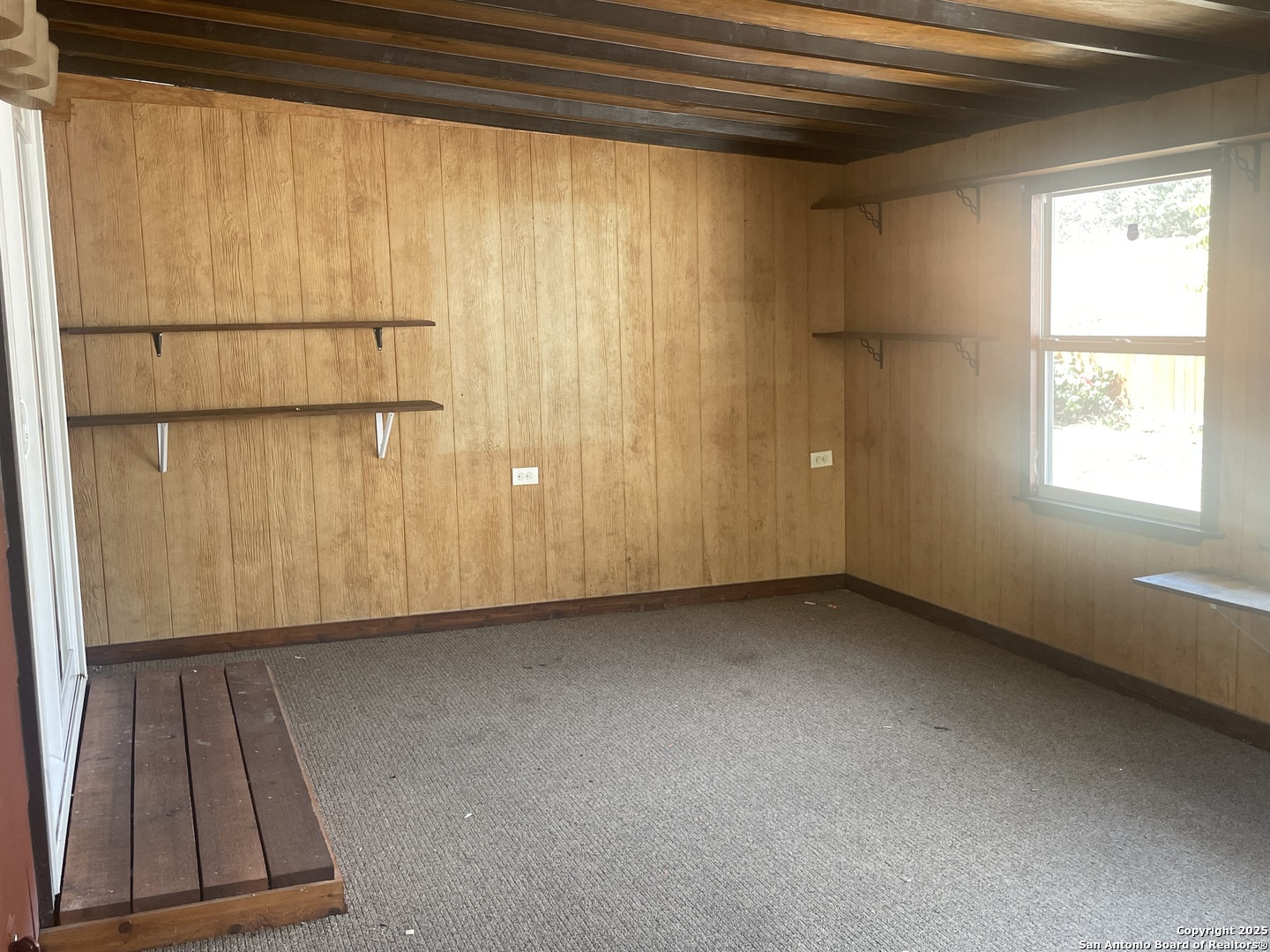 9411 Wahada Avenue San Antonio, TX 78217 - Photo 14 of 49 a view of an empty room with a window