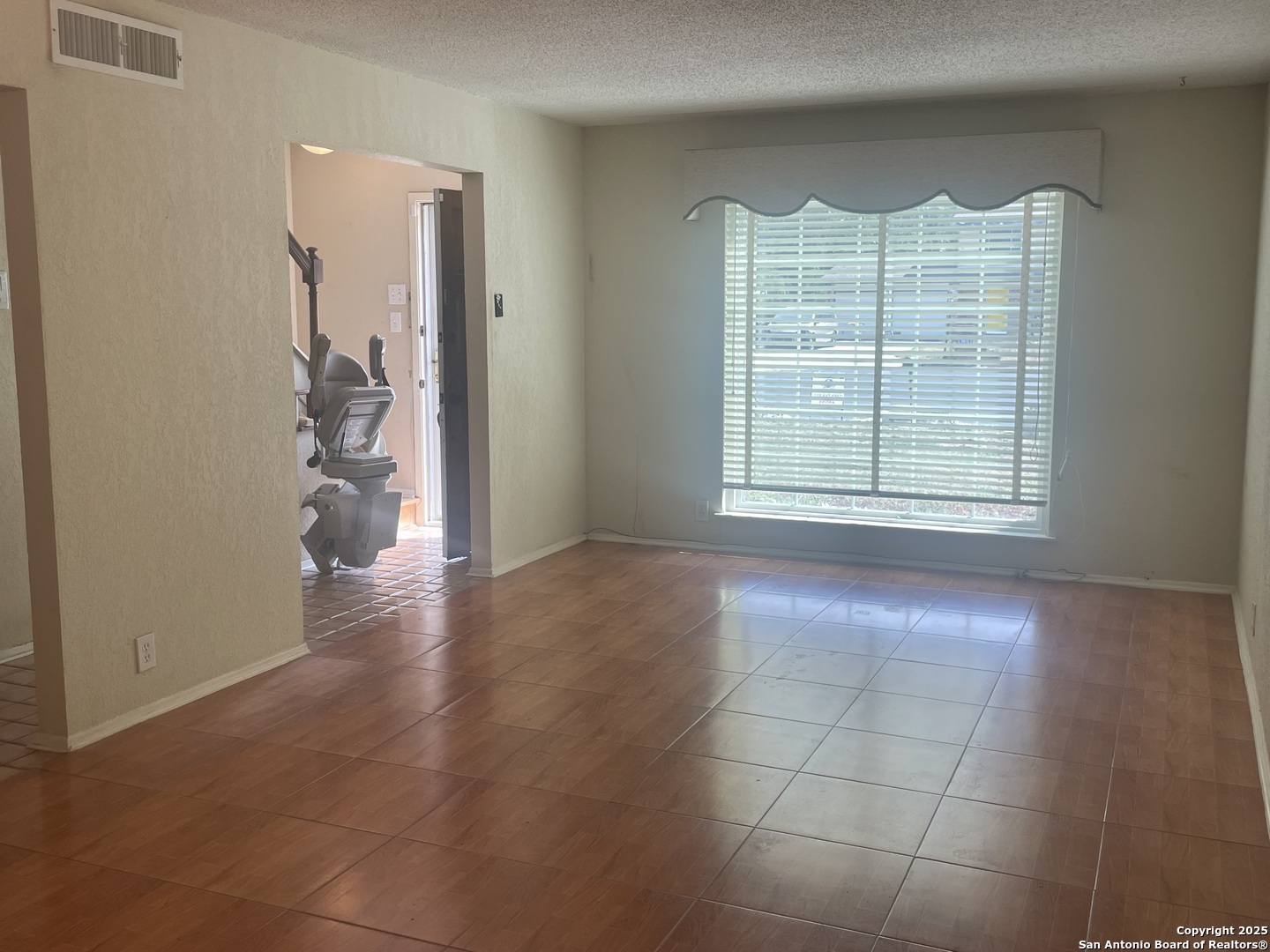 9411 Wahada Avenue San Antonio, TX 78217 - Photo 16 of 49 a view of an empty room with a window