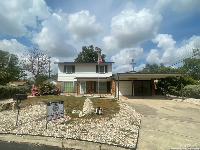 a view of a house with entertaining space