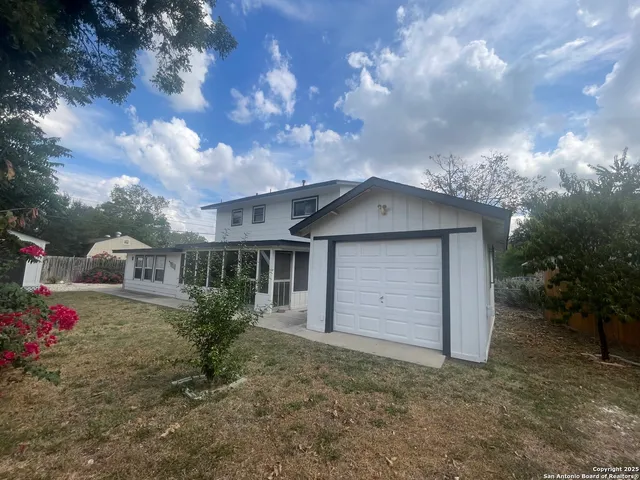 a view of cabinets and wooden floor