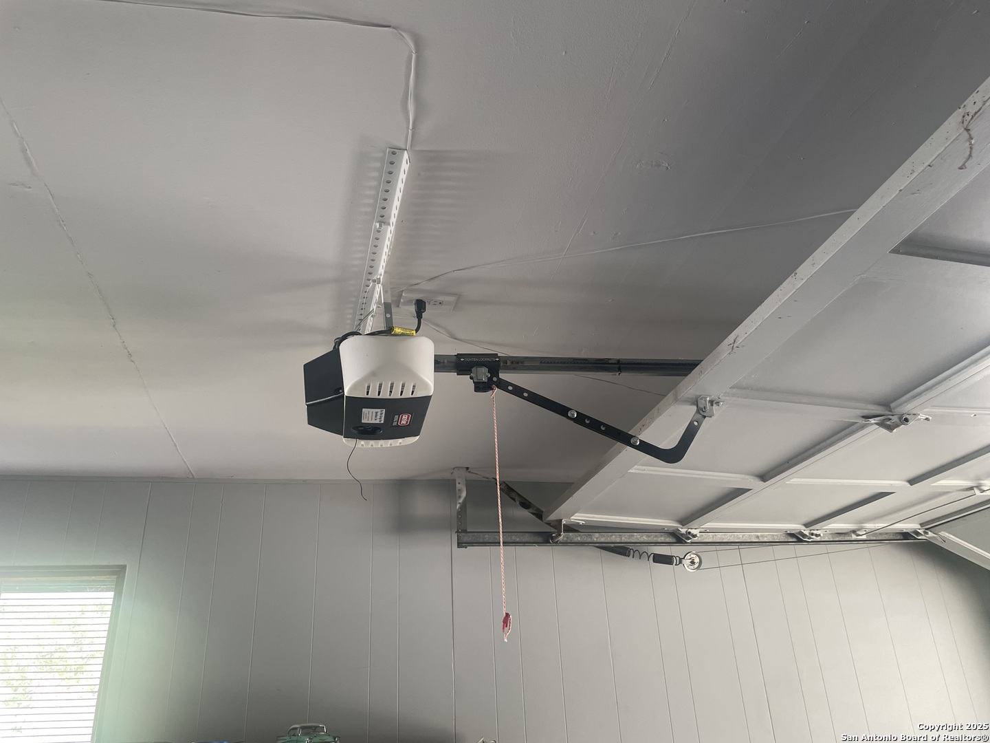 9411 Wahada Avenue San Antonio, TX 78217 - Photo 47 of 49 a room with a chandelier