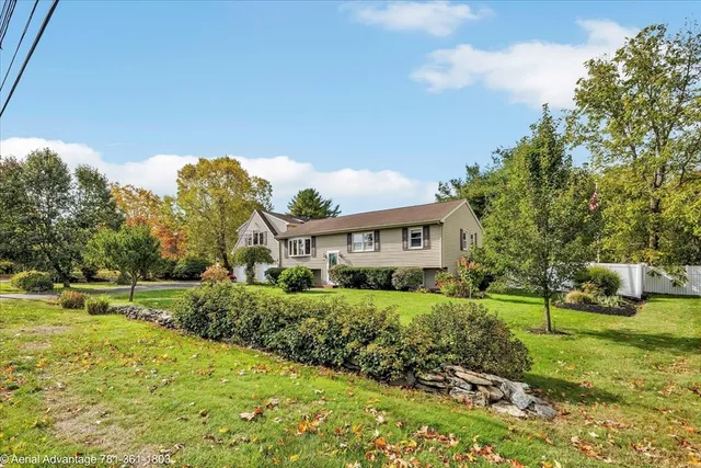 a view of a city with mountains in the background