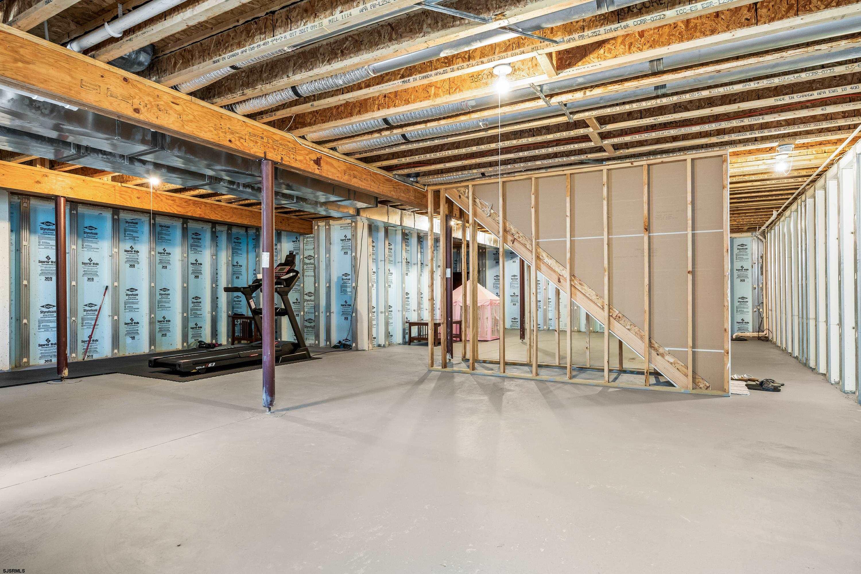 215 Surf Road Egg Harbor Township, NJ 08234 - Photo 22 of 31 a view of an empty room with stairs