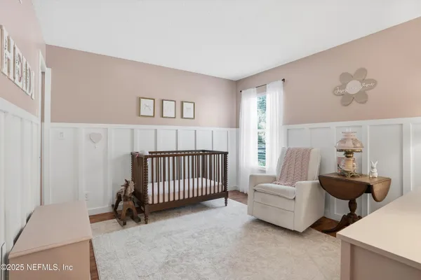 a bedroom with furniture and a couch