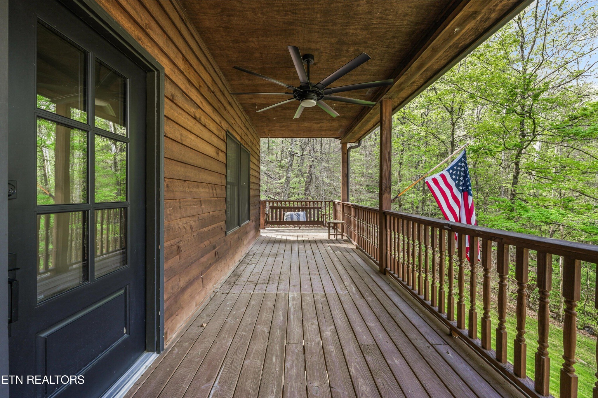 257 Lone Ridge Lane Heiskell, TN 37754 - Photo 11 of 60 a view of a balcony with wooden floor