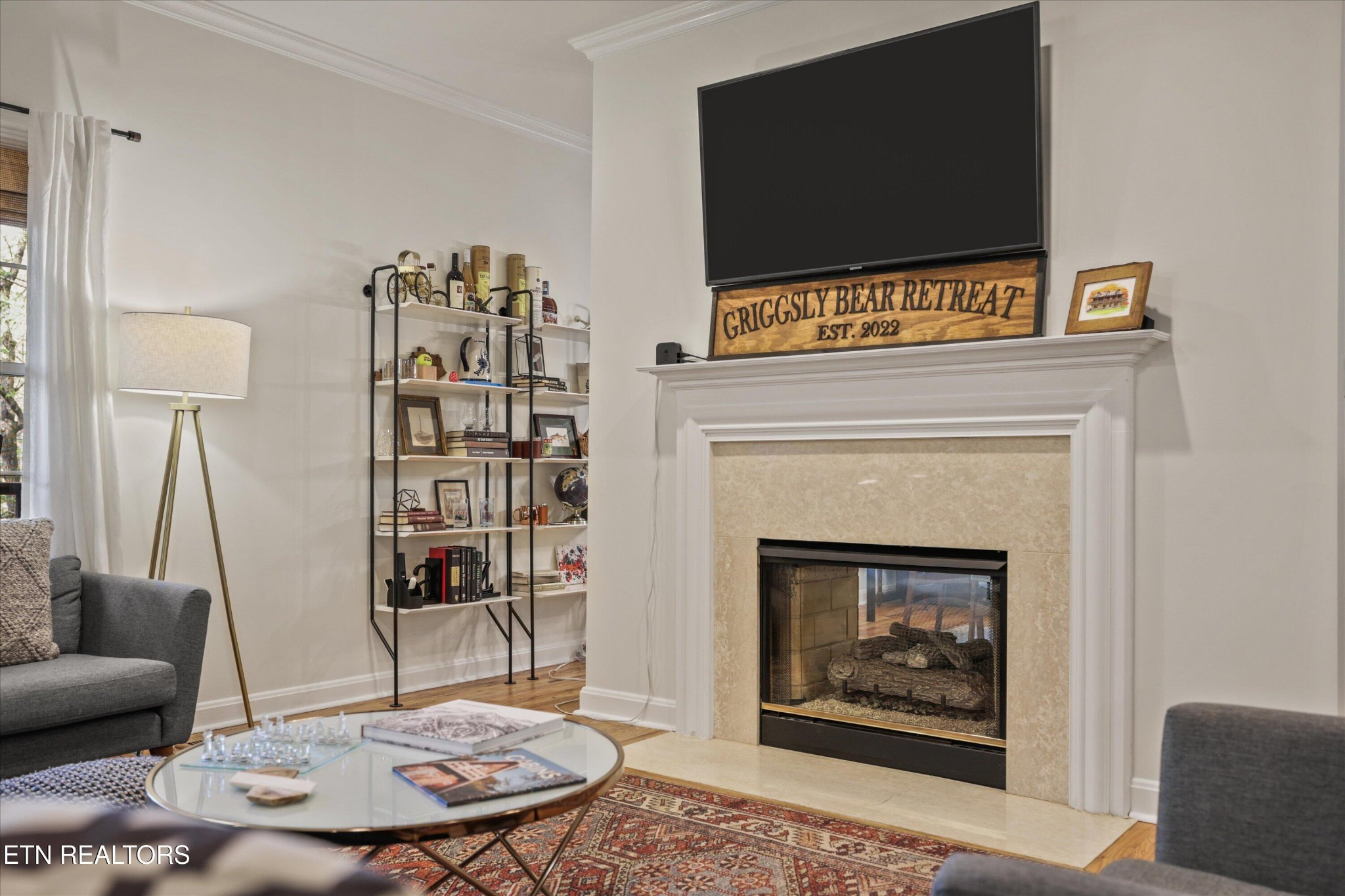 257 Lone Ridge Lane Heiskell, TN 37754 - Photo 15 of 60 a living room with furniture and a fireplace