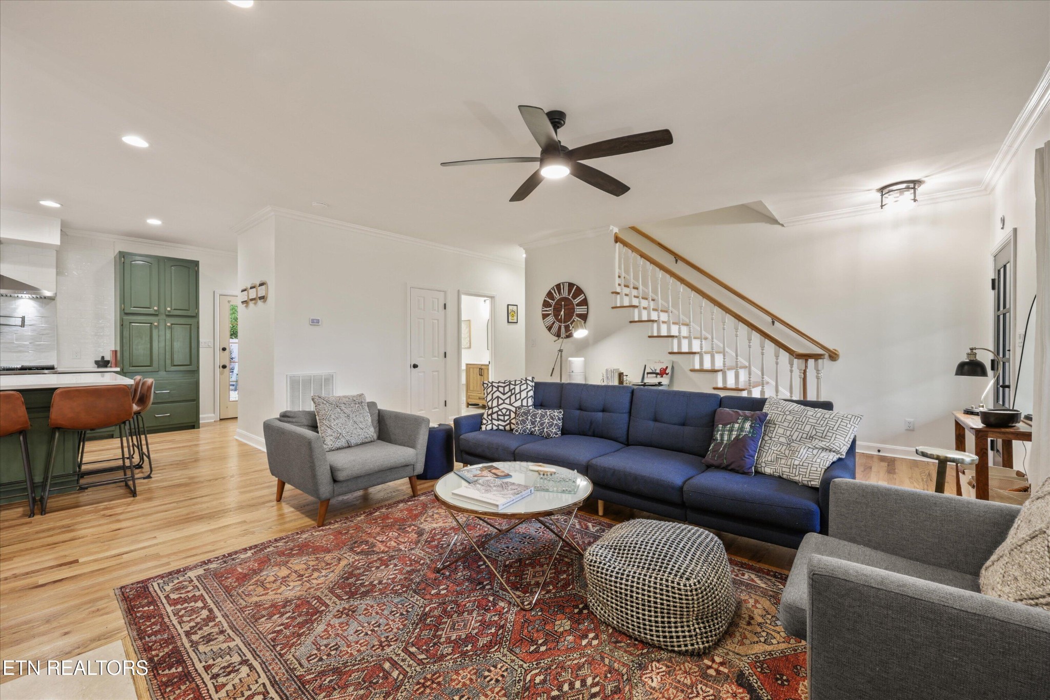 257 Lone Ridge Lane Heiskell, TN 37754 - Photo 17 of 60 a living room with furniture a rug and a chandelier