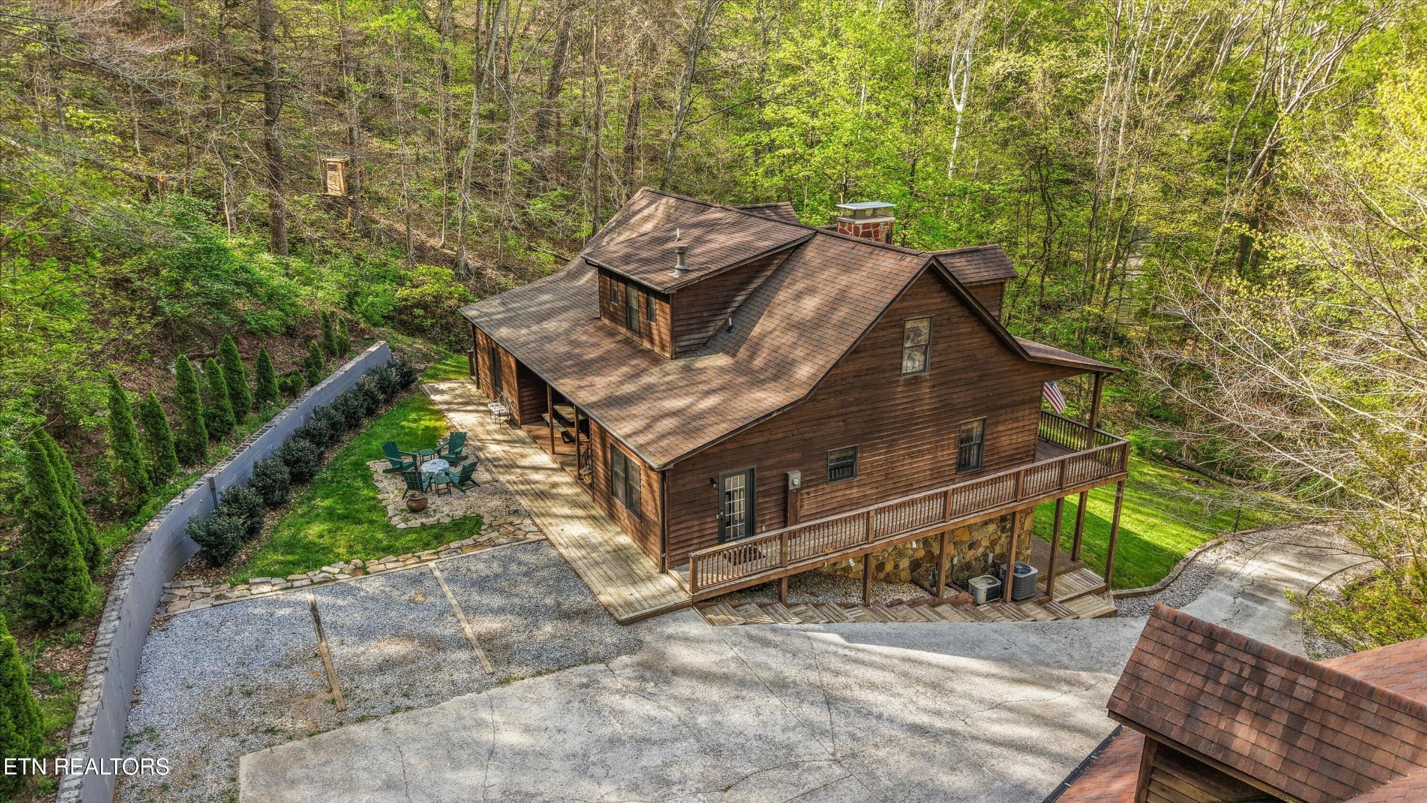 257 Lone Ridge Lane Heiskell, TN 37754 - Photo 55 of 60 a view of a small house with a yard