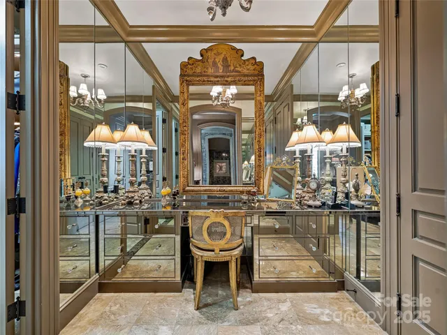 a view of a hallway with seating area