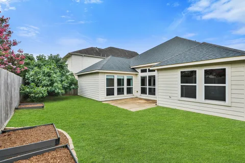 a house view with a garden space