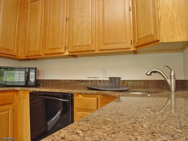 a room with a dresser and a mirror