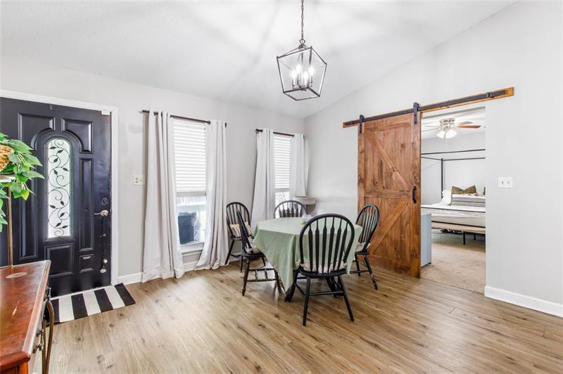 237 Mona Place Dallas, GA 30132 - Photo 12 of 28 a view of a dining room with furniture window and wooden floor