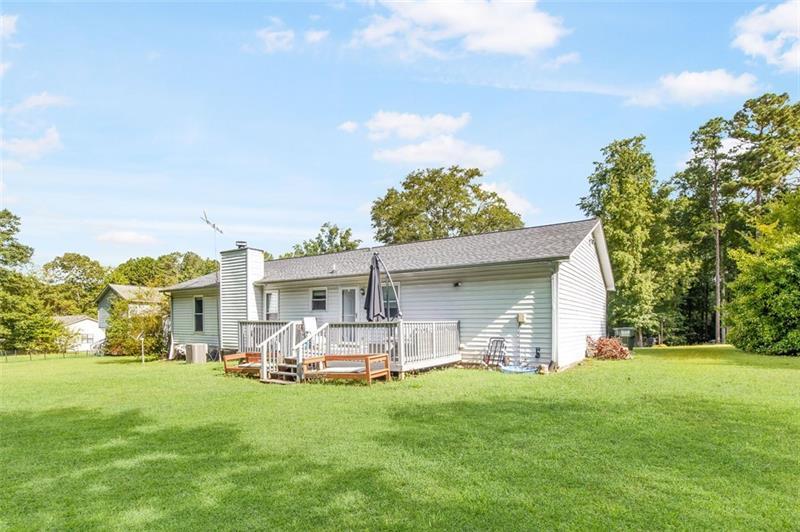 237 Mona Place Dallas, GA 30132 - Photo 25 of 28 a front view of house with yard and green space
