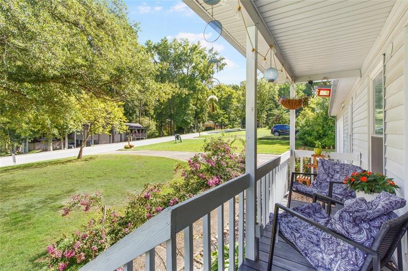 237 Mona Place Dallas, GA 30132 - Photo 28 of 28 a view of a porch with furniture and garden