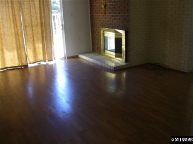 750 Wyoming Avenue Reno, NV 89503 - Photo 2 of 7 a view of a room with wooden floor and a window