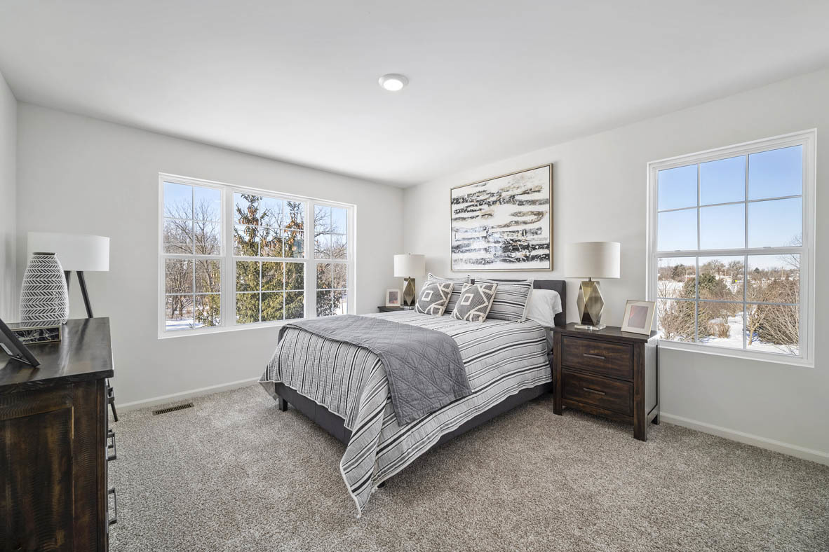 3743 Bailey Road Yorkville, IL 60560 - Photo 13 of 20 a spacious bedroom with a bed and a window
