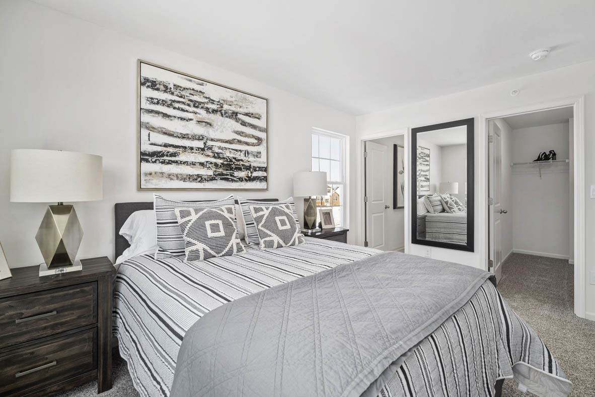 3743 Bailey Road Yorkville, IL 60560 - Photo 14 of 20 a bedroom with a bed and a night stand