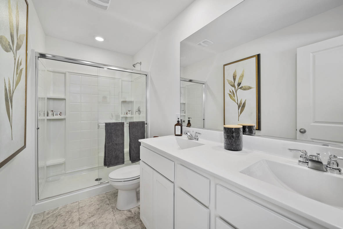 3743 Bailey Road Yorkville, IL 60560 - Photo 15 of 20 a bathroom with a granite countertop sink toilet and shower