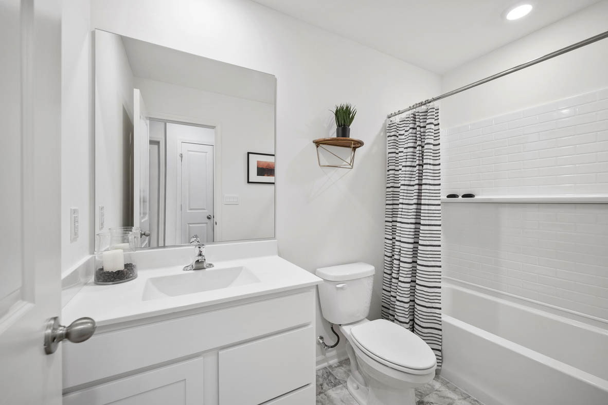 3743 Bailey Road Yorkville, IL 60560 - Photo 18 of 20 a bathroom with a sink toilet and shower